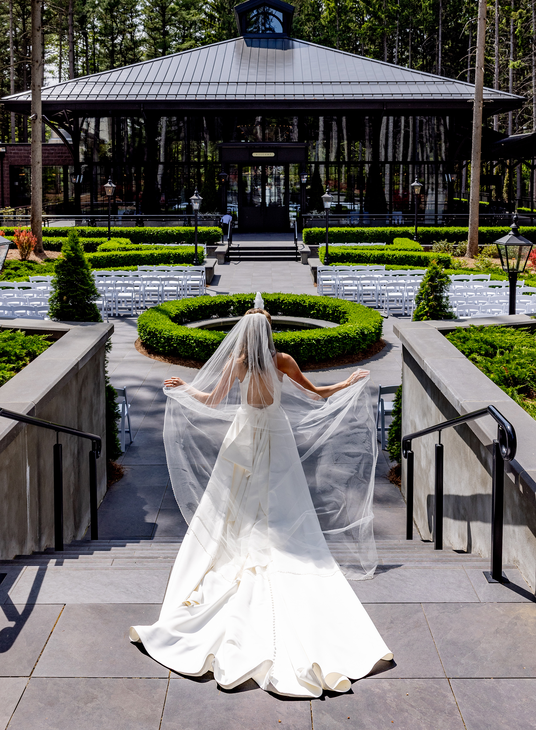 Bride walking at Shepherd's hollow courtyard