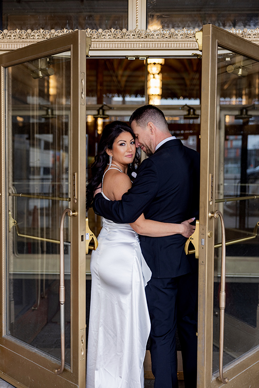 Romantic bar portraits of Gabrielle and Jimmy in Detroit after their Fisher Building engagement session